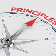 Compass with Needle Pointing to the word Principles